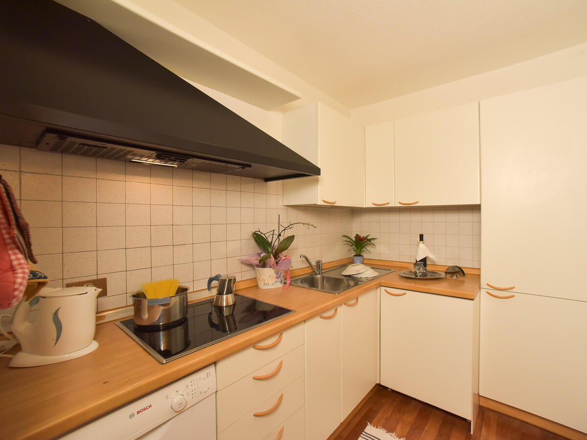 a kitchenette with all appliances